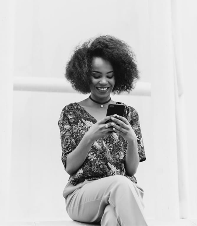 Woman smiling with phone