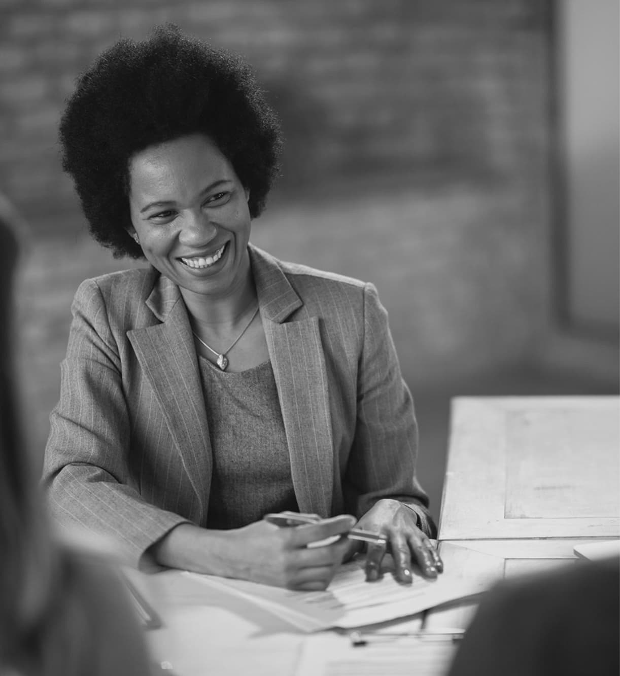 Business woman talking with papers